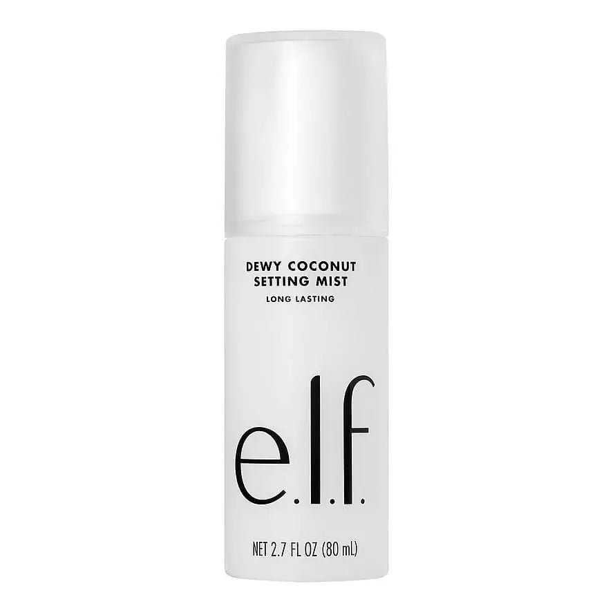 A white cylindrical bottle of e.l.f. Dewy Coconut Setting Mist with black text on a clean white background.